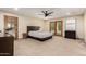 Bright main bedroom featuring a minimalist aesthetic, carpet flooring, and wood accents at 1938 E Myrna Ln, Tempe, AZ 85284