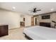 Bright and spacious main bedroom with a view of the ensuite bathroom and walk-in closet at 1938 E Myrna Ln, Tempe, AZ 85284