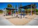 Shaded playground with swing sets and climbing structures creates a fun outdoor space for children at 1938 E Myrna Ln, Tempe, AZ 85284