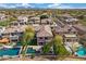 Stunning aerial view of a home featuring a backyard oasis with pool, patio, and lush landscaping at 22206 N 36Th Way, Phoenix, AZ 85050