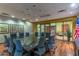 A large conference room with a modern table, comfortable chairs, and natural light at 22206 N 36Th Way, Phoenix, AZ 85050