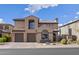 Attractive two-story house showcasing a charming window and neat landscaping under a blue sky at 22206 N 36Th Way, Phoenix, AZ 85050