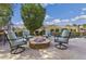 Inviting outdoor fire pit area with comfortable seating, perfect for relaxing evenings by the pool at 22206 N 36Th Way, Phoenix, AZ 85050