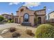 Inviting front yard with lush landscaping, gravel accents, and a cozy walkway at 22206 N 36Th Way, Phoenix, AZ 85050