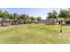 Outdoor sand volleyball court with lush green space, perfect for recreational fun at 22206 N 36Th Way, Phoenix, AZ 85050