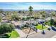 Expansive aerial view of the neighborhood showcasing homes and city skyline in the distance at 2237 E Windsor Ave, Phoenix, AZ 85006