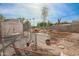 Backyard featuring chain link fence, shed, and foliage in various states of disrepair at 2237 E Windsor Ave, Phoenix, AZ 85006