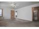 Living room featuring a ceiling fan, natural light and entrance to bathroom at 2237 E Windsor Ave, Phoenix, AZ 85006