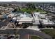 An aerial view shows the community clubhouse, pool, tennis courts, and golf course at 25236 S Lakeway Dr, Sun Lakes, AZ 85248