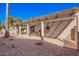 Shaded patio area with gravel landscaping, offering a relaxing outdoor living space at 25236 S Lakeway Dr, Sun Lakes, AZ 85248