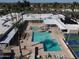 Aerial view of the community pool, perfect for relaxing, alongside shaded seating and recreation at 25236 S Lakeway Dr, Sun Lakes, AZ 85248