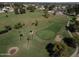 Scenic aerial of community golf course featuring manicured greens and mature trees at 25236 S Lakeway Dr, Sun Lakes, AZ 85248