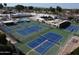 Aerial shot of community tennis courts, close to a pool and clubhouse, offering recreational amenities at 25236 S Lakeway Dr, Sun Lakes, AZ 85248