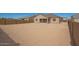 Large, level lot backyard is ready for landscaping, a pool, or your dream outdoor living space at 25372 N 158Th Ct, Surprise, AZ 85387