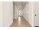 Bright hallway with tile flooring that leads to the main living areas of the home at 25372 N 158Th Ct, Surprise, AZ 85387