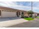 Charming single-story home with a well-manicured lawn and a two-car garage at 2662 S Springwood Blvd # 461, Mesa, AZ 85209