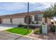 Charming single-story home with a well-manicured lawn and a two-car garage at 2662 S Springwood Blvd # 461, Mesa, AZ 85209