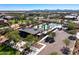 Aerial view of a community amenity center with a pool, BBQ, lounge area, and residential neighborhood at 2843 E Los Gatos Dr, Phoenix, AZ 85050