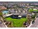 Aerial view of the community clubhouse, pool, playground and surrounding neighborhood at 2843 E Los Gatos Dr, Phoenix, AZ 85050