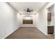 Bright bedroom with a modern ceiling fan, and a window overlooking a private yard at 2843 E Los Gatos Dr, Phoenix, AZ 85050