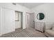 Airy bedroom featuring modern décor, geometric rug and streamlined furniture at 328 E Ivy St, Mesa, AZ 85201