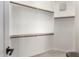 Spacious walk-in closet with ample shelving and rod space for organized storage at 328 E Ivy St, Mesa, AZ 85201