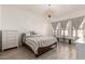 Spacious main bedroom featuring a neutral color palette and natural lighting at 328 E Ivy St, Mesa, AZ 85201