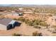 Beautiful aerial view of desert homes with a desert landscape at 34515 N 142Nd St, Scottsdale, AZ 85262