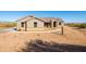 Attractive desert home featuring a neutral palette, and a paved walkway at 34515 N 142Nd St, Scottsdale, AZ 85262