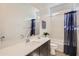 Bright bathroom featuring a marble countertop, vanity, and a tub at 3794 E Terrel St, San Tan Valley, AZ 85143