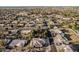 Neighborhood aerial view of many homes and mature landscaping in a suburban setting at 3954 E Florian Ave, Mesa, AZ 85206