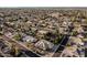 Wide angle aerial view showcasing the neighborhood's layout and the manicured yards of each property at 3954 E Florian Ave, Mesa, AZ 85206