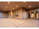 A view of the covered patio with views through the large windows and doors into the home at 3954 E Florian Ave, Mesa, AZ 85206