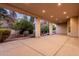 Spacious covered patio with concrete flooring, recessed lighting, and views of the landscaped backyard at 3954 E Florian Ave, Mesa, AZ 85206