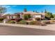 Charming single-story home with a well-manicured landscape and a neutral color scheme at 3954 E Florian Ave, Mesa, AZ 85206