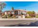 Single-story home with tile roof, neutral paint, desert landscaping, and sidewalk at 3954 E Florian Ave, Mesa, AZ 85206