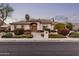 Charming single-story home with neutral paint, a tile roof, and lush landscaping at 3954 E Florian Ave, Mesa, AZ 85206