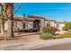 Single-story home with tile roof, neutral paint, desert landscaping, and sidewalk at 3954 E Florian Ave, Mesa, AZ 85206