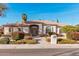 Single-story home with tile roof, neutral paint, desert landscaping, and sidewalk at 3954 E Florian Ave, Mesa, AZ 85206