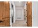 Hallway with tile flooring and wooden doors at 3954 E Florian Ave, Mesa, AZ 85206