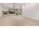 Spacious living room featuring a fireplace, carpet flooring, recessed lights, and lots of natural light at 3954 E Florian Ave, Mesa, AZ 85206