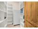 Organized pantry with white shelving and ample storage space at 3954 E Florian Ave, Mesa, AZ 85206