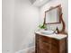 Charming powder room with a vintage sink and stylish mirror at 3954 E Florian Ave, Mesa, AZ 85206