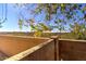 Private backyard view showcasing a lush desert landscape and mountain views beyond the privacy wall at 40716 N Hudson Trl, Anthem, AZ 85086