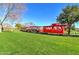 All aboard the community train for Gathering fun on the turfed lawn at 40716 N Hudson Trl, Anthem, AZ 85086