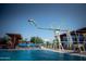 Take the plunge at the community diving pool with diving board and poolside seating at 40716 N Hudson Trl, Anthem, AZ 85086