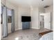 Bedroom featuring tile floors, neutral walls, and a doorway with access to another room at 4202 E Broadway Rd # 211, Mesa, AZ 85206