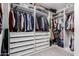 A well-organized walk-in closet featuring custom shelving and drawers to maximize storage space at 4226 E Marlene Dr, Gilbert, AZ 85296