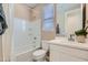 Clean bathroom featuring a shower-tub combo with white tile surround, and a white vanity at 4634 E French Rd, San Tan Valley, AZ 85143