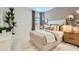 Cozy bedroom featuring a comfortable bed, neutral color scheme, and unique decorative accents at 4634 E French Rd, San Tan Valley, AZ 85143